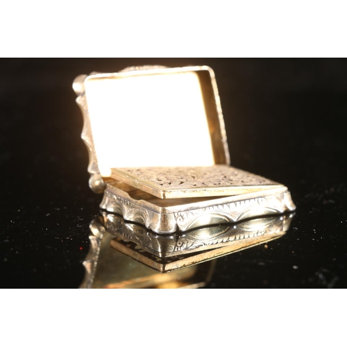 108 - Victorian antique parcel gilt silver vinaigrette of rectangular form with serpentine edge having all... 