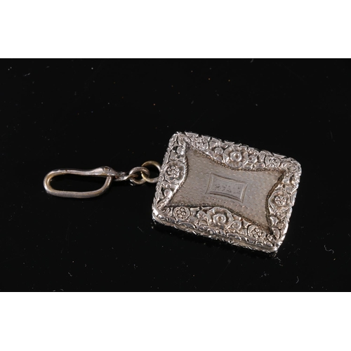 110 - Victorian antique parcel gilt silver vinaigrette of rectangular form with relief floral decorated bo... 