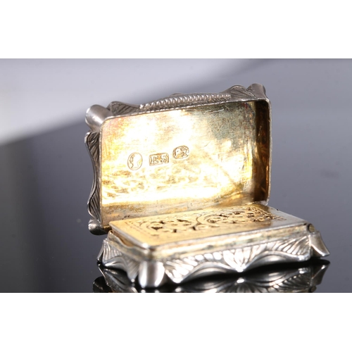 113 - Victorian antique silver vinaigrette of rectangular form with shaped edge, the top and bottom surfac... 