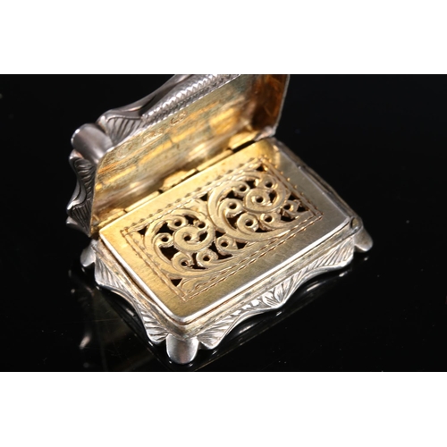 113 - Victorian antique silver vinaigrette of rectangular form with shaped edge, the top and bottom surfac... 