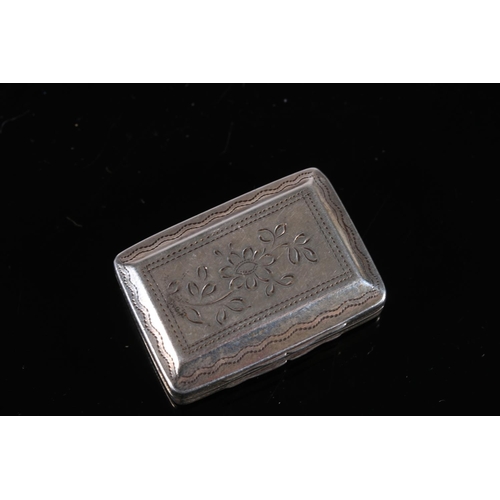 119 - Georgian antique silver vinaigrette of rectangular form with chamfered edges and engraved scrolling ... 