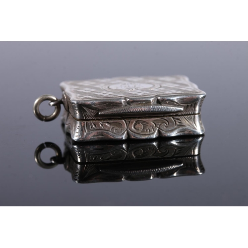 120 - Victorian antique silver vinaigrette of rectangular form with serpentine edge, the body incised with... 