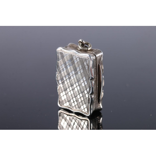 120 - Victorian antique silver vinaigrette of rectangular form with serpentine edge, the body incised with... 