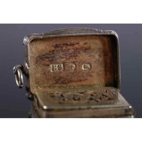 120 - Victorian antique silver vinaigrette of rectangular form with serpentine edge, the body incised with... 