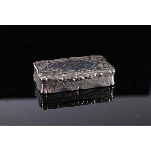 84 - Victorian antique silver snuff box of rectangular form with scroll border, the body with all over sc... 