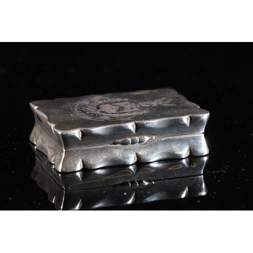 86 - Edwardian antique parcel gilt silver snuff box of rectangular form with scrolling border and concave... 