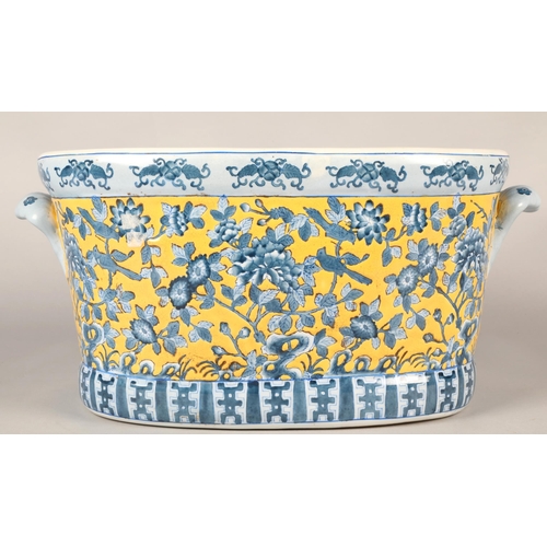 289 - Large modern Oriental jardiniere with floral and aquatic designs, approx. 40cm diameter