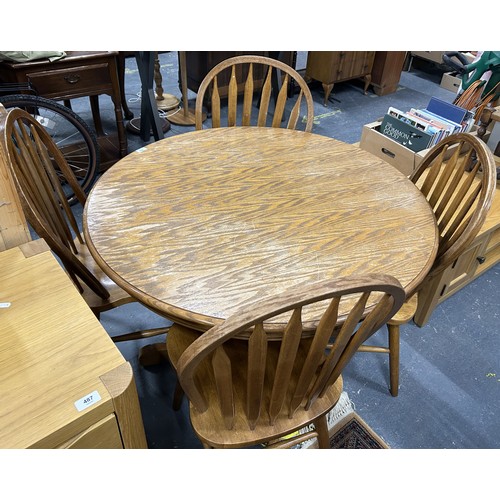 353 - Country style pedestal table and four chairs.