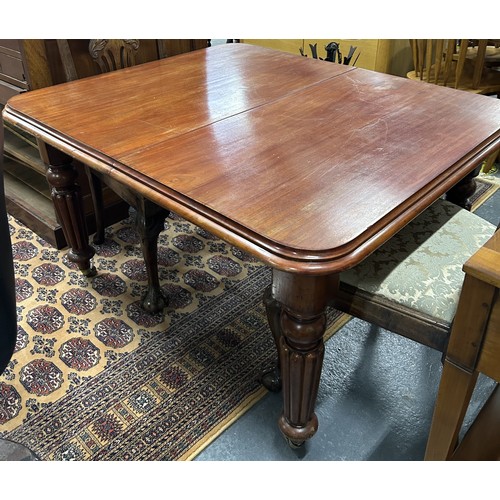 358 - Small mahogany dining table.