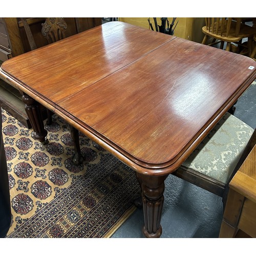 358 - Small mahogany dining table.