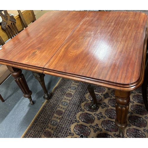 358 - Small mahogany dining table.