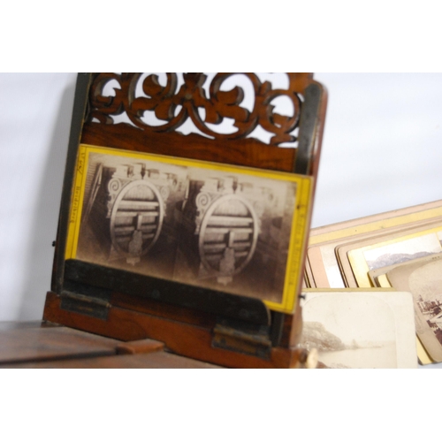 274 - Victorian walnut table viewer and a collection of viewing cards.