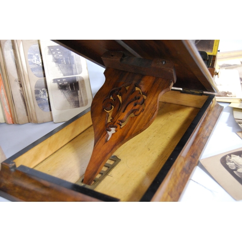 274 - Victorian walnut table viewer and a collection of viewing cards.