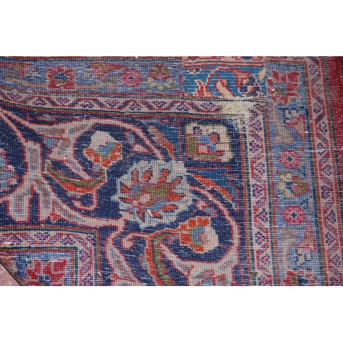 412 - Persian Kashan hand-knotted carpet with large floral medallion to the centre, surrounded by foliate ... 