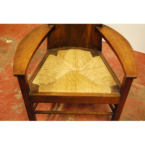 427 - Arts & Crafts-style oak hall chair after a design by Charles Rennie Mackintosh, with high tapere... 