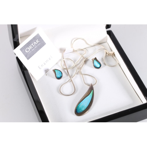 501 - Malcolm Gray for Ortak, a silver and enamel teardrop shaped pendant and pair of matching earrings in... 