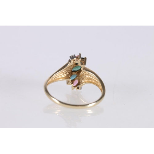 513 - 9ct gold dress ring set with three green navette shape tourmalines flanked by pink topaz and two sma... 