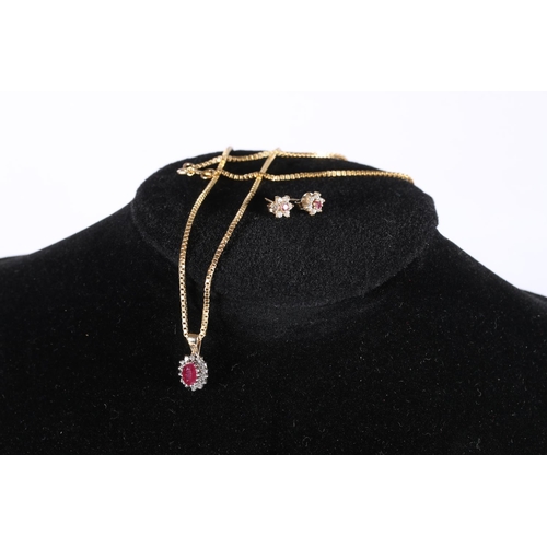 514 - 9ct gold ruby and white stone cluster pendant on 9ct gold chain with matching earrings