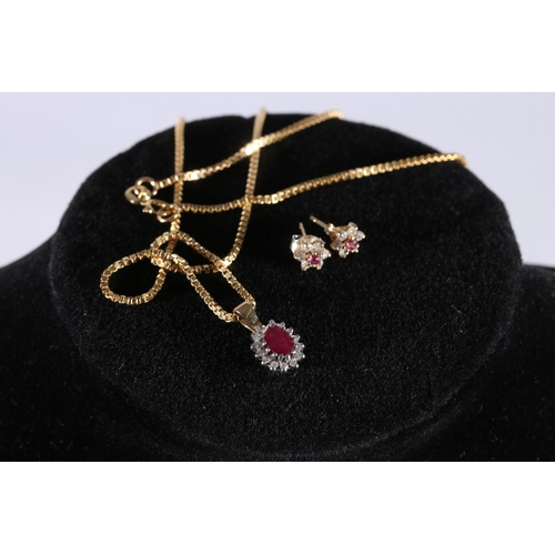 514 - 9ct gold ruby and white stone cluster pendant on 9ct gold chain with matching earrings