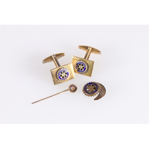 528 - Pair of silver gilt and enamel Rotary International cufflinks together with a matching gilt metal la... 