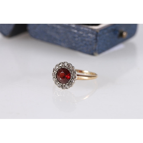 532 - Early 20th century garnet and white stone cluster ring on gold band (hallmark rubbed, possibly 18ct)... 