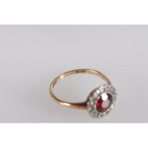 532 - Early 20th century garnet and white stone cluster ring on gold band (hallmark rubbed, possibly 18ct)... 