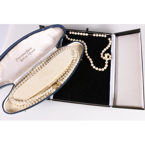 533 - Single strand cultured pearl necklace in Robert Anthony of Edinburgh retailers box, together with a ... 