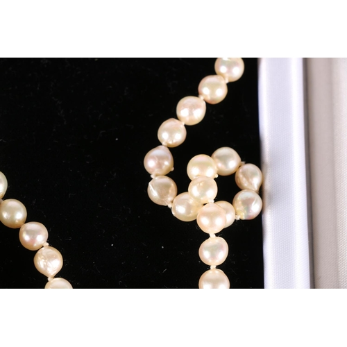 533 - Single strand cultured pearl necklace in Robert Anthony of Edinburgh retailers box, together with a ... 