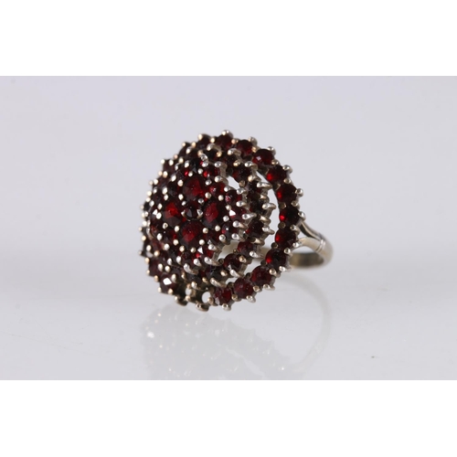 536 - Silver gilt and garnet cluster ring, size L.