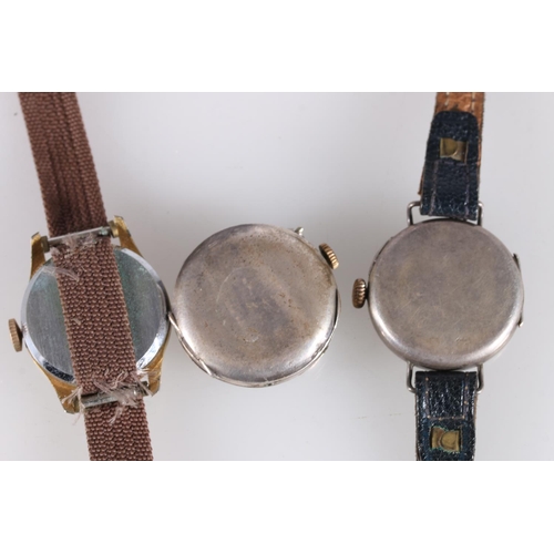 548 - Early 20th century trench style silver wristwatch, a similar wristwatch head and an Ingersoll wristw... 