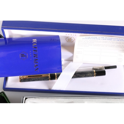 560 - Waterman of Paris presentation fountain pen with original box and guarantee, the top cap inscribed w... 