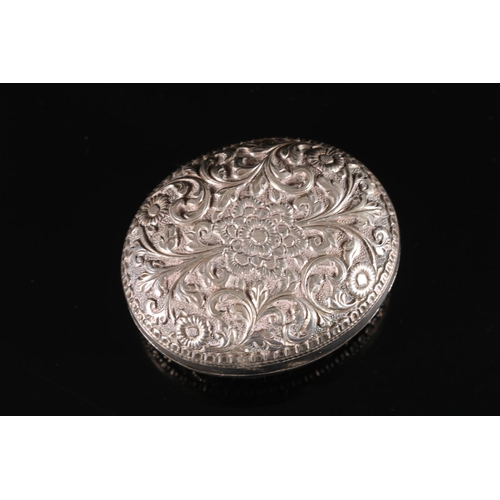 563 - Indian white metal two piece pill box embossed with flowers and scrolls, W6cm, 41g