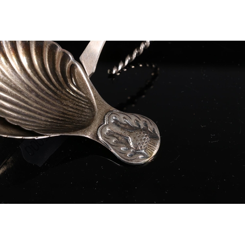 577 - Silver caddy spoon of shell form with thistle finial, makers JR, Birmingham 1962 together with a ben... 