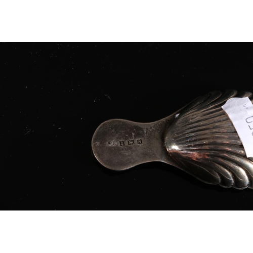 577 - Silver caddy spoon of shell form with thistle finial, makers JR, Birmingham 1962 together with a ben... 