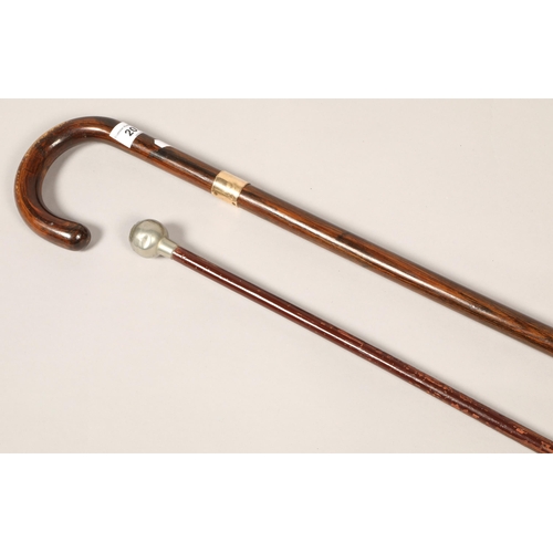 203 - Gilt metal mounted walking stick & a swagger stick