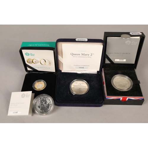 304 - Five coins to include Royal Mint 'Nations of the Crown 2017 UK £1', coin celebrating the chris... 