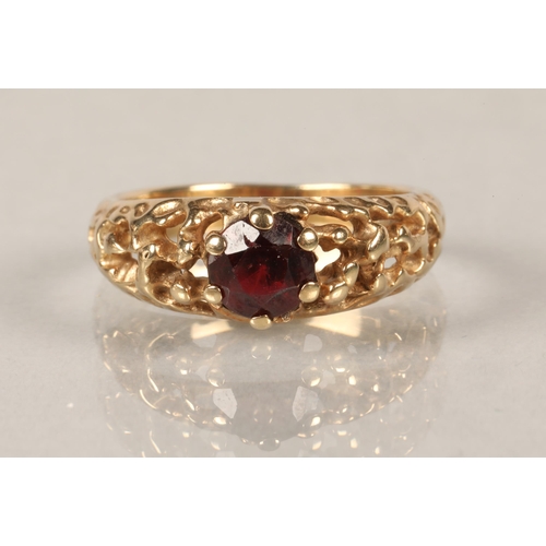 73 - 9 ct gold dress ring with garnet.ring size G/H