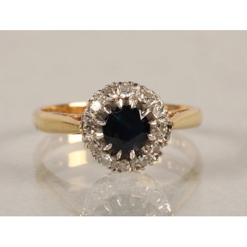 74 - 18 ct gold Diamond and sapphire ring.ring size L