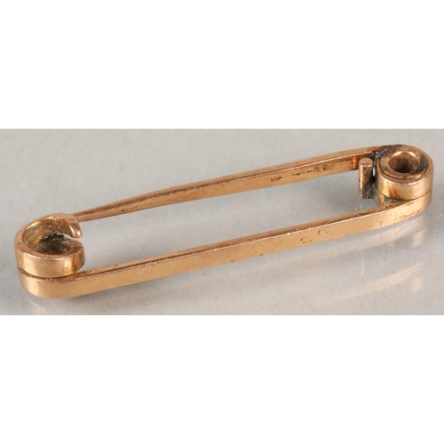 81 - 9 ct Rose gold brooch, 3 grams