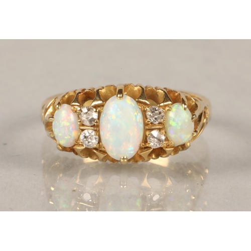 86 - Gold, diamond and opal dress ring,ring size L