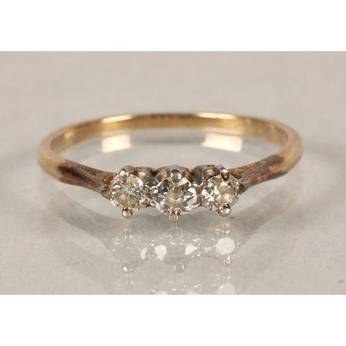 90 - 18 ct gold and three stone diamond ring,ring size N/O