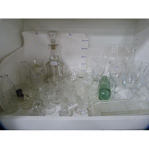 111 - Glassware to include a Georgian-style decanter, assorted crystal glasses, green glass bottle, glass ... 