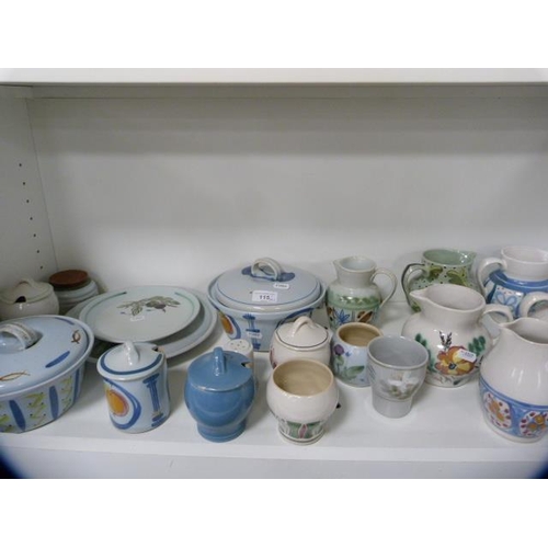 115 - Collection of Buchan stoneware to include jugs, tureens and covers, dishes etc (one shelf).