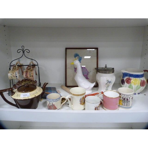 123 - Ceramic commemorative tankards, biscuit barrel, puzzle ware teapot (spout a/f) and an Ambience break... 