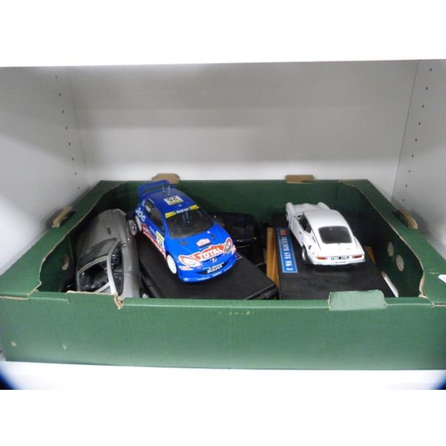 130 - Box of model cars, mainly Chinese models, to include Aston Martin Vanquish, Triumph GT6, Clarion 206... 