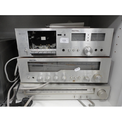 131 - Rotel stereo receiver and cassette deck, Hitachi tuner and a Wharfedale CD player.