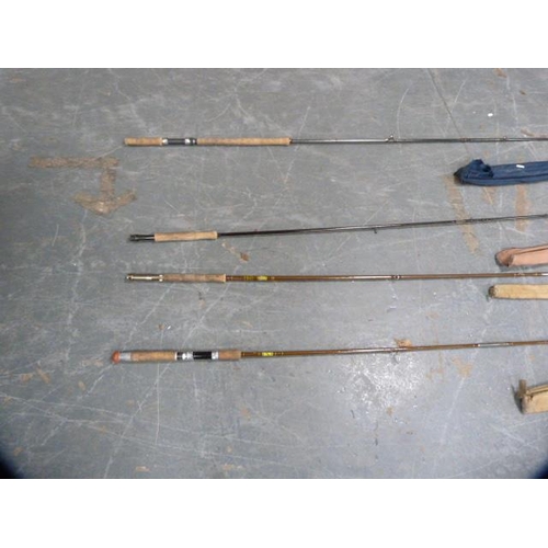 147 - Four fishing rods to include two Milbro two-piece rods, Daiwa C98 two-piece salmon rod and a Supreme... 