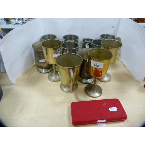 162 - Group of pewter and EP tankards and goblets, also a cased EP christening spoon and fork.