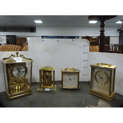 171 - Four assorted modern mantel clocks to include a German example, Swiza 8, London Clock Company and Ra... 