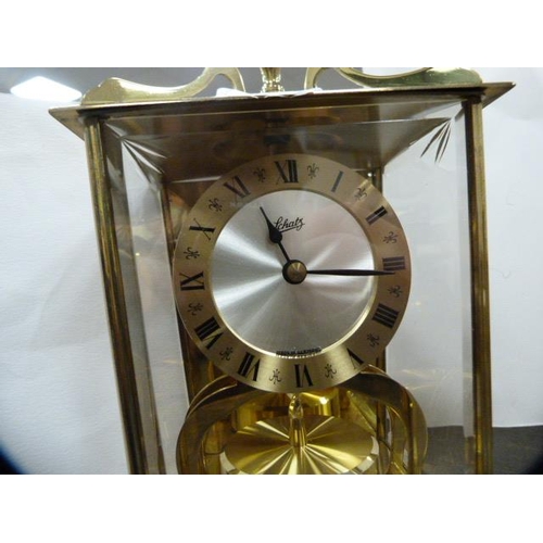 171 - Four assorted modern mantel clocks to include a German example, Swiza 8, London Clock Company and Ra... 